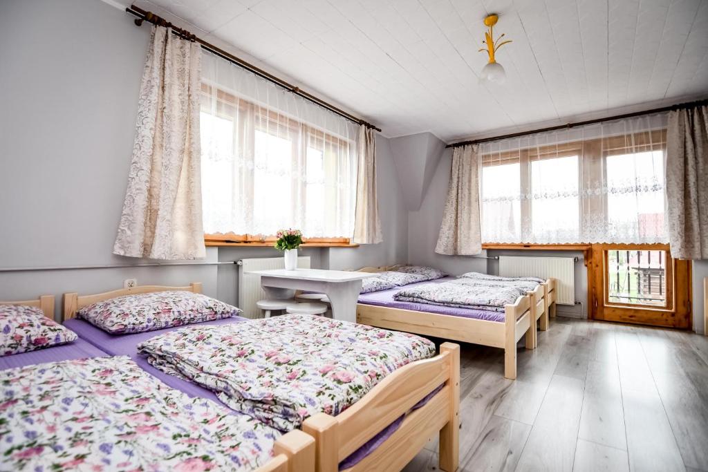 Family Room with Balcony at Dom Wypoczynkowy u Ewy